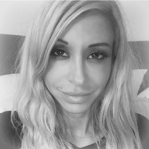 Headshot photo ofKate Cohen, co-founder of Straight Up Impact and film producer.